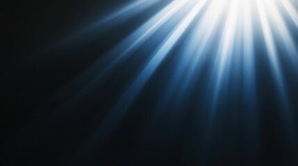 Lens flare with a cool blue tint on a dark backdrop, subtle gradient light rays extending outward, clean aesthetic,