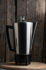 Obraz premium Coffee maker on wooden background. Kitchen utensils.