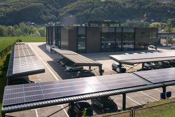 Parking space with solar panels on a roof. Solar canopy