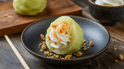 Lotus cream-stuffed mochi with cookie crumbs