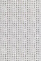 Naklejka premium White background of the LEGO Classic baseplate