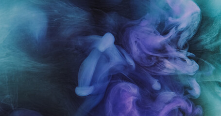 Fototapeta premium Ink water shot. Color smoke. Blur purple blue dust particles texture explosion vapor splash spreading abstract art background.