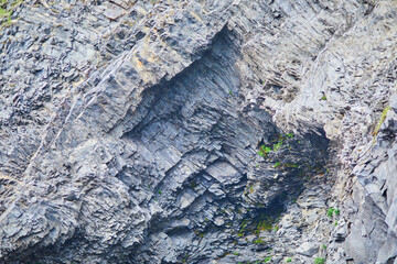 Basalt rock formations on Reynisfjara Black Sand beach near Vik in Iceland