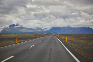 Majestic summer landscapes with cliffs and fields in Southern Iceland.