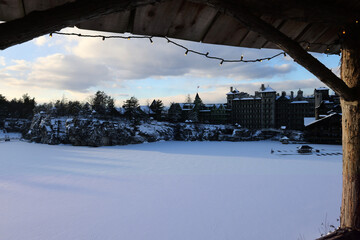 sunset view of famous hotel and wooden gazebo along hiking trail in upstate new york near new paltz...
