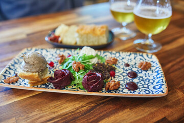 Delicious smoked puffin meat served with bread and pasty in a restaurant in Iceland.