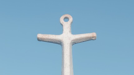 White anchor against blue sky, hope symbol