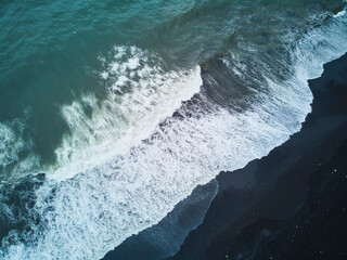Aerial scenic view of Reynisfjara black sand beach near Vik in Southern Iceland.