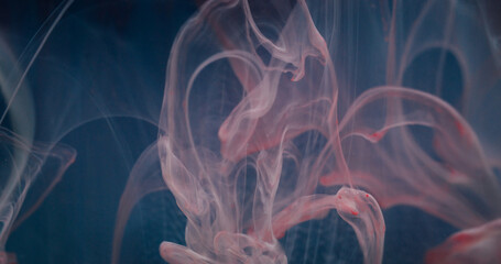 Liquid paint flow. Blur water ink. Defocused pink blue colorful shine drops smoke mist fog texture mix wave on abstract art background.