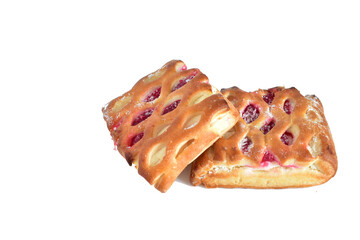 Cookies with cherry jam filling lie on a white background.