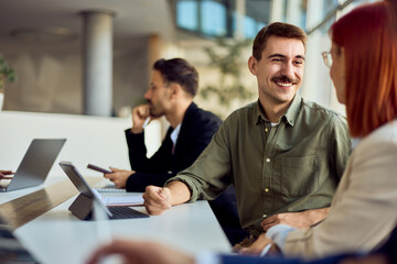 Group of Professionals Engaged in a Business Meeting at Modern Office Workspace