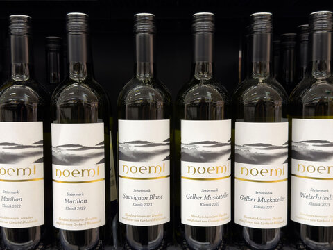 Variety of austrian white wines on display shelf