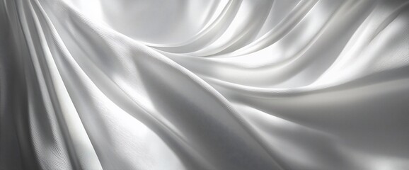 Fototapeta premium Draped white silk fabric with soft folds and shadows.