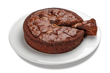 Chocolate sponge cake with slice on white plate isolated