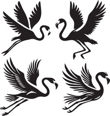 Elegant Black and White Silhouettes of Flamingos in Flight