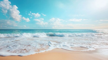 Fototapeta premium Calm morning at a beach where soft waves wash over golden sand under a bright blue sky with scattered clouds, reflecting the tranquility of nature