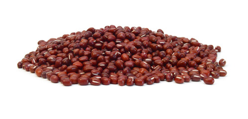 Adzuki beans pouring on white background