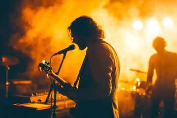 A musician performing on stage with passion. 