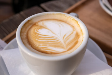 Elegant Cappuccino with Latte Art in White Cup