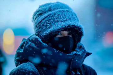 A person bundled up in warm winter attire