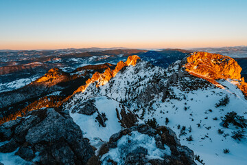 Fototapeta premium Winter hiking to Velky Rozsutec in Mala Fatra National park is full of beautiful views. Sunset in Slovakia mountains. Slovakia landscape