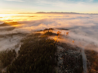 Sunset over Liptov region with and High Tatras mountains around. Liptovsky Mikulas landspace, slovakia.