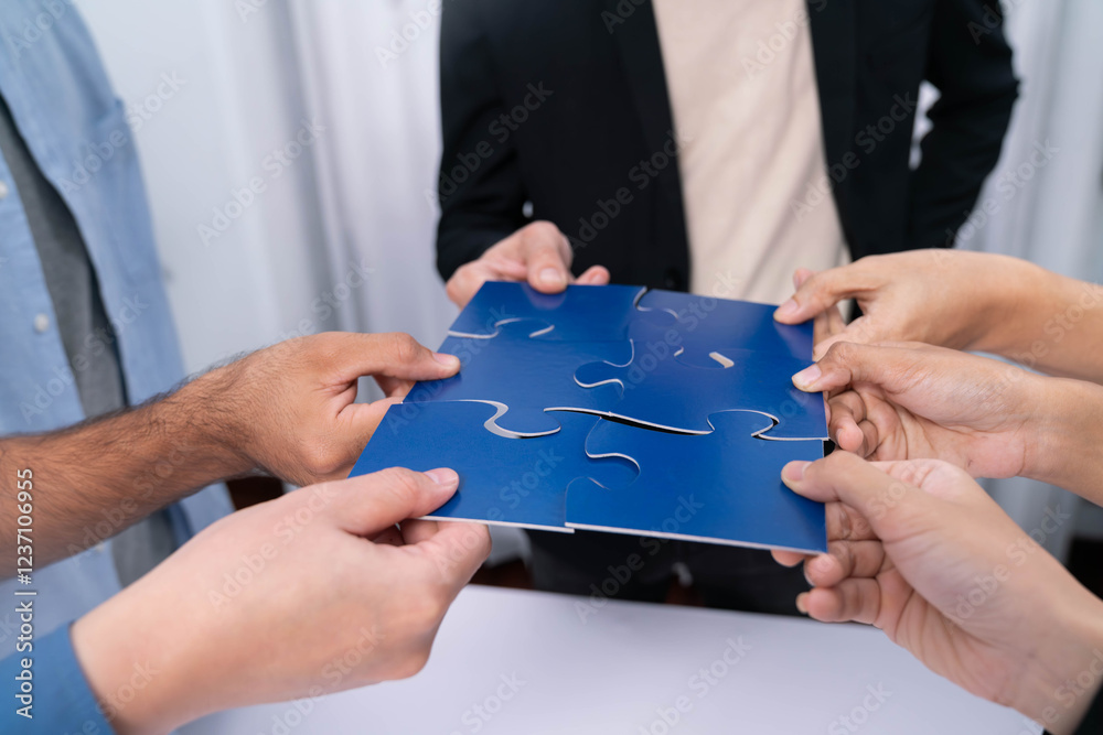 Fototapete Business team joining jigsaw puzzle together symbolize group of business partnership and strong collective unity teamwork in problem solving solution for business success. Prudent