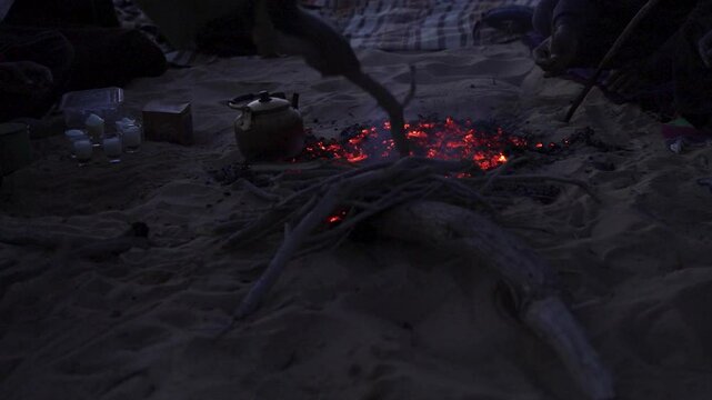 Touaregs cooking tea in Sahara desert