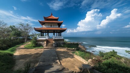 Fototapeta premium The Japanese Peace Pagoda in Rumassala, Sri Lanka is a sacred temple with stunning views of the Indian Ocean and Galle Dutch Fort.