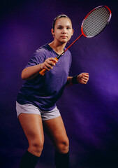 A portrait photograph of a young badminton player