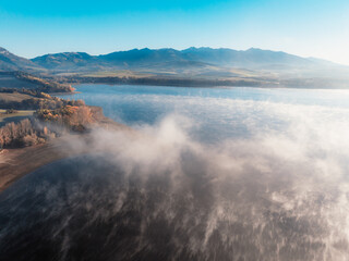 Sunset over Liptov region with and High Tatras mountains around. Liptovsky Mikulas landspace, slovakia.