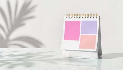 Calendar with colored sticky notes on reflective surface