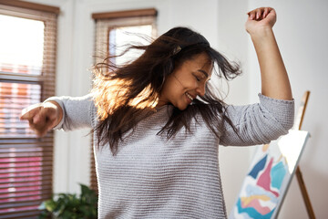 Happy, woman and dancing with fun at house for freedom, energy and music of good news celebration....