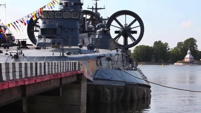 military landing craft air cushion at the pier
