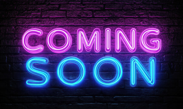 Vibrant neon coming soon sign glowing on a dark