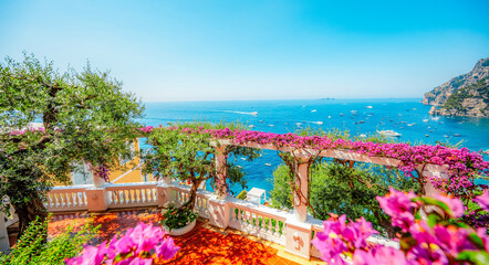 Positano coastline in south of Italy, vertiginous cliffs adorned with colorful villages, turquoise waters. Small town Positano on Amalfi Coast near Neapol, Italy