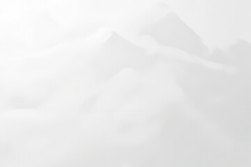 Fototapeta premium Serene Mountain Landscape with Fog and Soft White Atmosphere