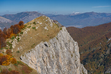 Valušnica Peak - Three Peaks Trail. Also a view of Plav town. Accursed Mountains (Prokletije National Park). Hikers visible on the peak. Montenegro, Balkans