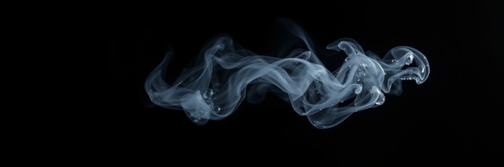 Fototapeta premium Smoke wisps against a dark background