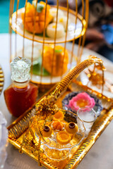 Desserts in a golden tray