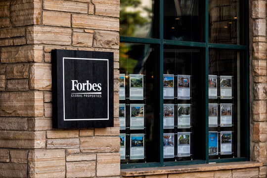 Beaver Creek, USA - October 8, 2022: Vacation town in Colorado with sign for Forbes global real estate properties for Slifer Smith and Frampton