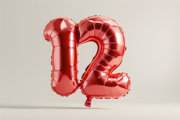 Multi-colored foil balloons in the shape of number 12 on a white background
