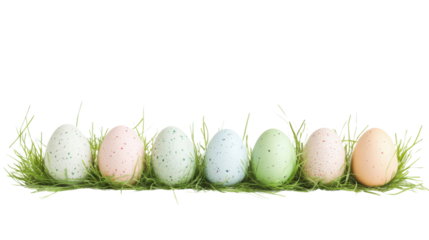 Seven pastel colored easter eggs lying on green grass with transparent background