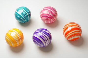 Fototapeta premium A group of colorful marbles arranged in a circular pattern.