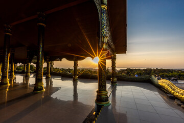 Background of the tourist attraction Wat Sirindhorn Wararam or the famous glowing temple in...