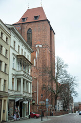 Fototapeta premium Torun Old Town Street And Medieval Cathedral