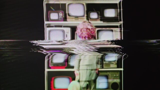 small girl watches a televisions wall with distortion on the screens in vertical