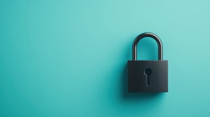 Fototapeta premium A stylish black padlock against a vibrant teal background, symbolizing security and protection.