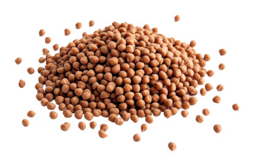 Brown seeds scattered on a white surface isolated on transparent background