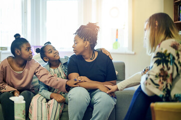 Family, therapy and children support mother in counseling session, consulting and help for parenting. Psychology, mental health and mom with kids at therapist with empathy, care and love from divorce